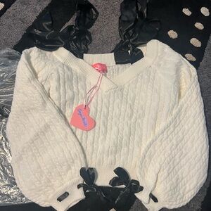 Sugar Thrillz White V-Neck Sweater with Black Ribbon Details